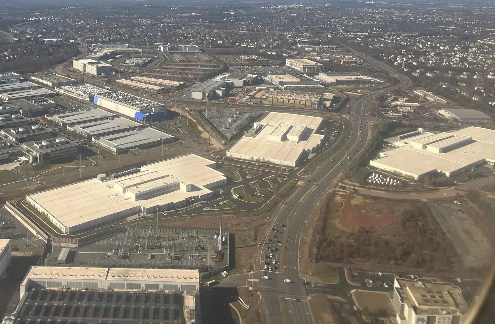 Rows of data center buildings seen from the air